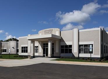 Exterior shot of the front entrance of UCA High School